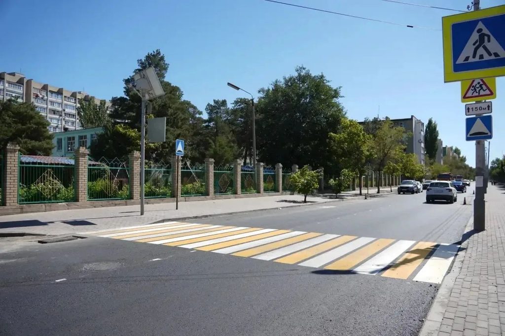 На улице Коммунистической уложили 18 тысяч квадратных метров нового асфальта — фото 1